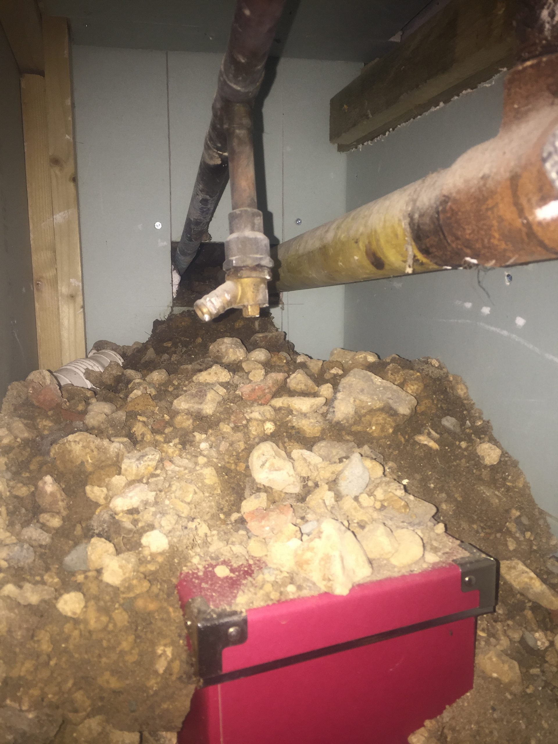 Image of excavations under a house caused by rats